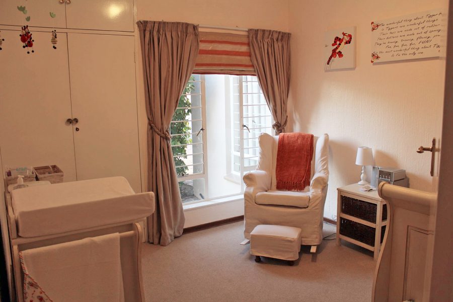 Photo of Lauren's armchair, her favourite piece of furniture in it's prior use in the nursery as a rocking chair in her home in Ballito, Durban, South Africa