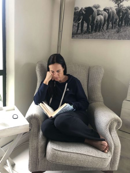 Photo of Lauren in her armchair, her favourite piece of furniture in a her home in Ballito, Durban, South Africa