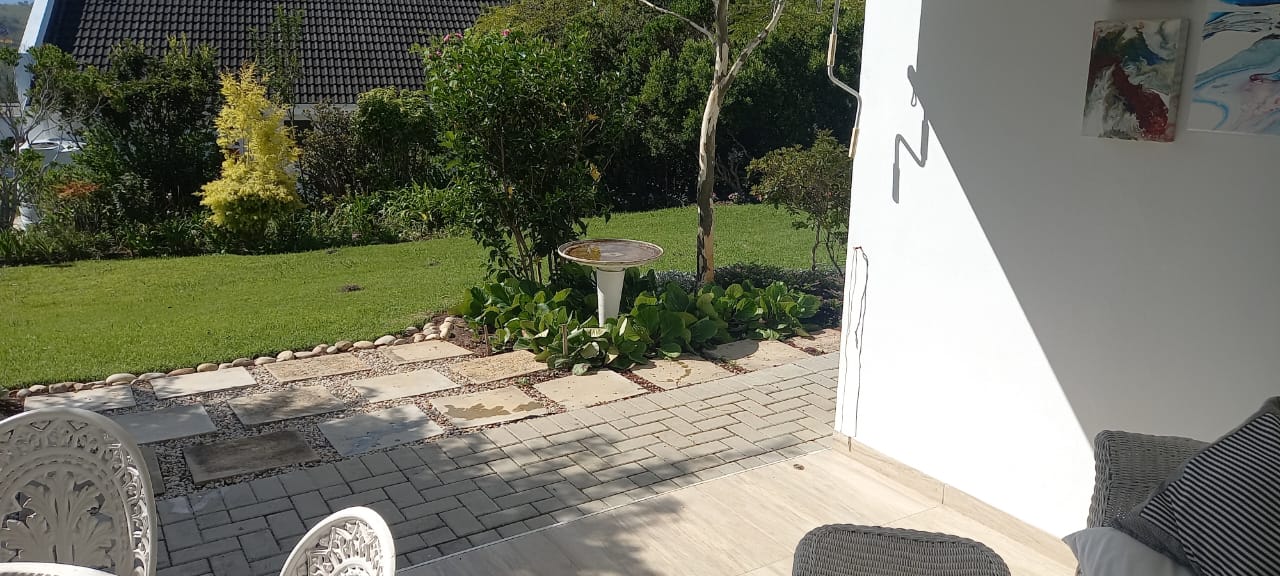 From the sheltered verandah one has the bird bath in close proximity and Guinea fowls often stroll past during the day.