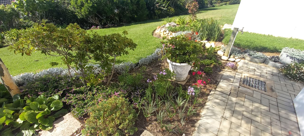 Flowerbeds are well cared for with the assistance of a gardener and a source of continual joy for sharing with friends and neighbourswith in and outside the complex.