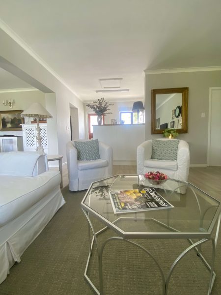Open plan living space with lounge, dining room and kitchen