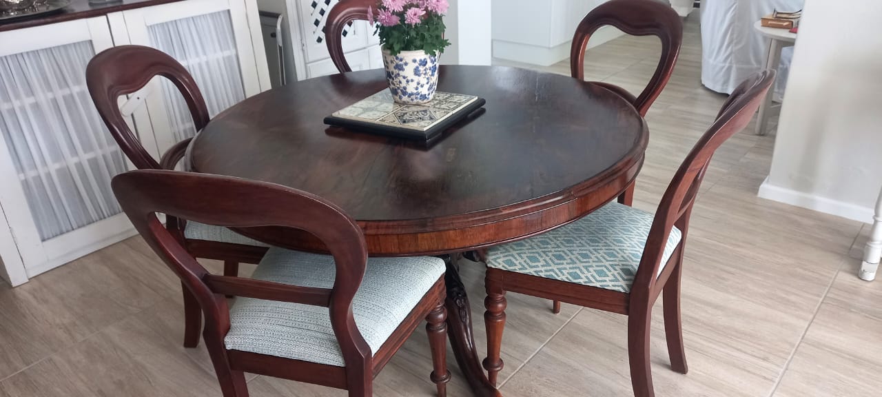 Photo of a dining room table and chairs in South Africa | Copper Beech Place Homestory