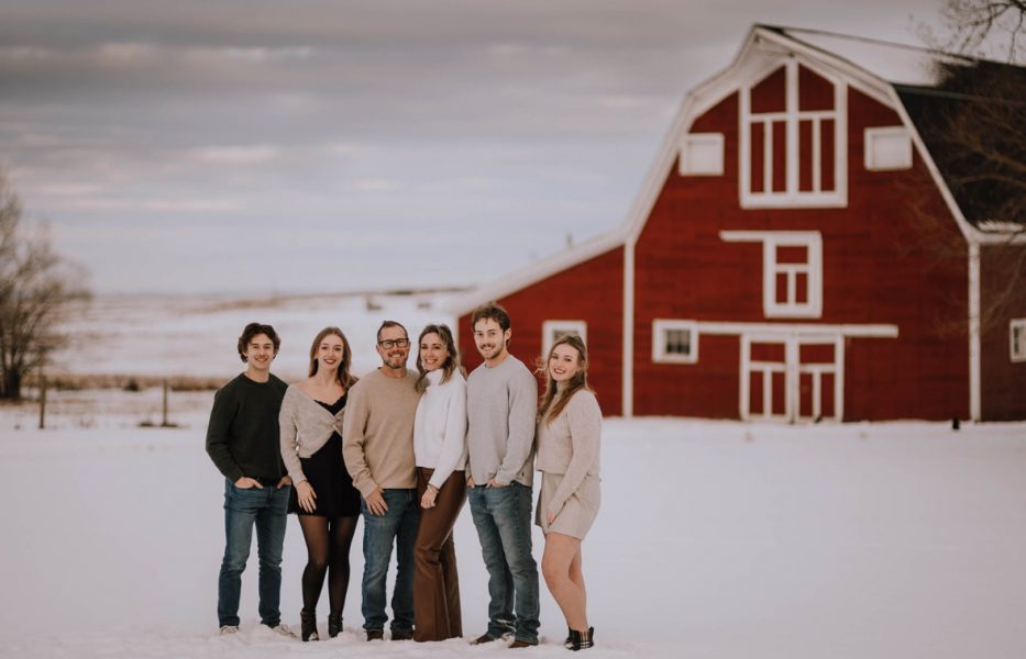 The Keer family in front of the original family homestead on the ranch.