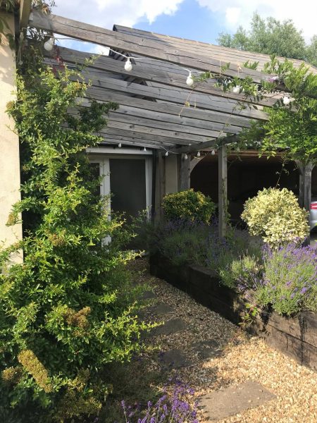 Photo of a pergola constructed relatively early on in the renovation project.