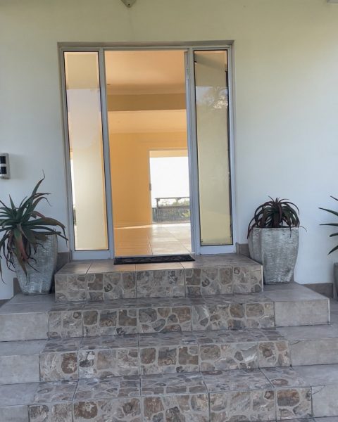 Photo of the steps leading up to the front door entrance