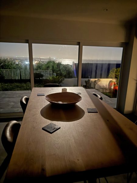 Photo of the seating area bathed in the light of the full moon.