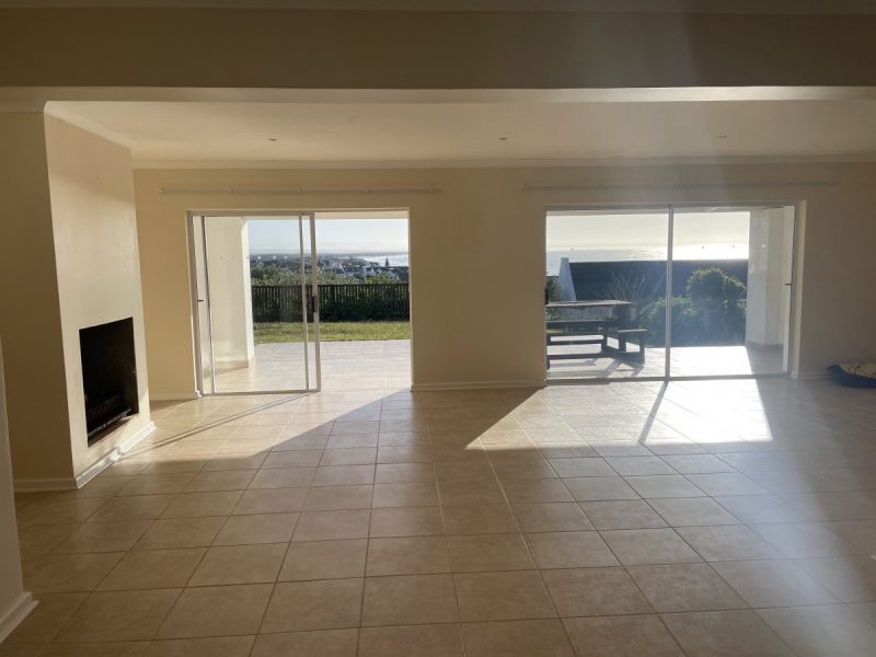 Photo of the first impression of the living room space before extending it by enclosing the patio.