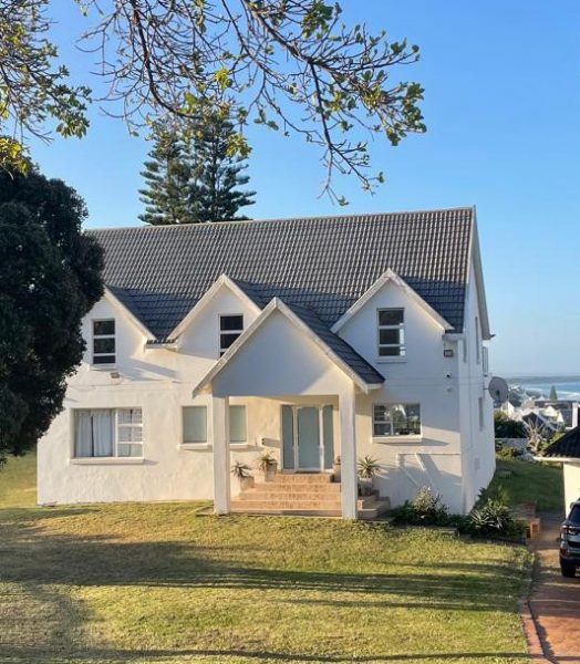 Photo of the front of the house after the garden clean out had been done.
