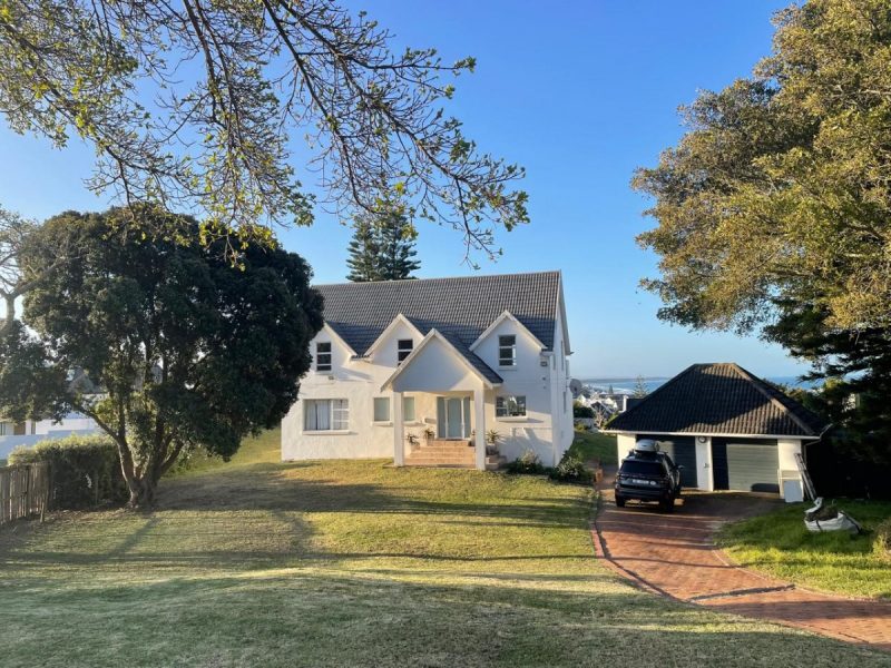 Photo of the front of the house after the garden clean out had been done.