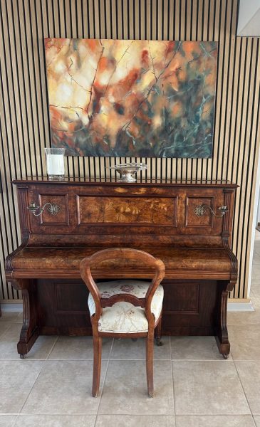 Photo of a family heirloom - the piano - a piece of art in itself