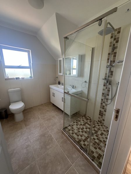 Photo of one of the bathrooms to be renovated in the future.