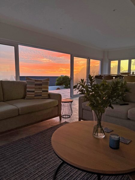 Photo of the sunset view from the living space in the newly enclosed patio.