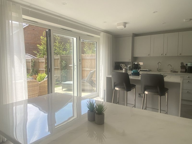 Photo of the kitchen and dining area leading onto the terrace