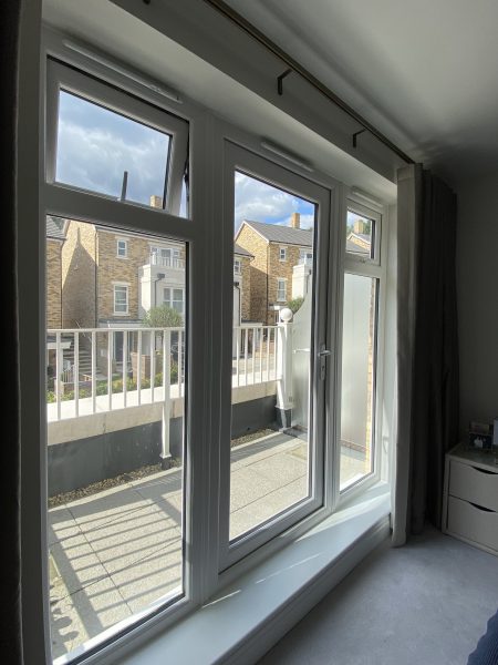 Photo of the generously sized door and windows leading off the main en suite bedroom