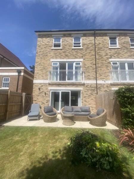 Photo of the rear view of the house as seen from the garden