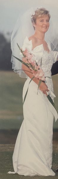 Photo of a bride with a gown created by Dorothy