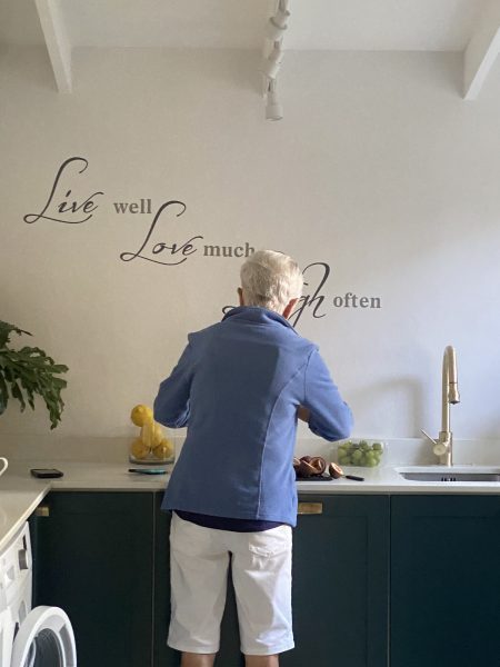 Photo of a lady preparing food in the kitchen
