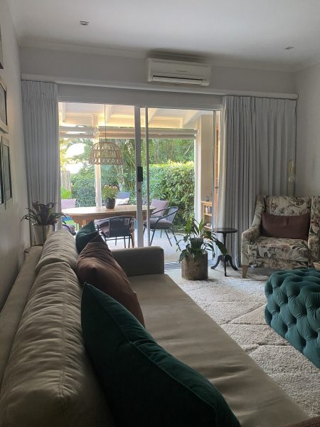 Photo of lounge and verandah beyond