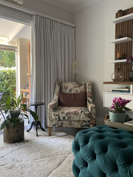 Photo of an armchair in the corner of the lounge