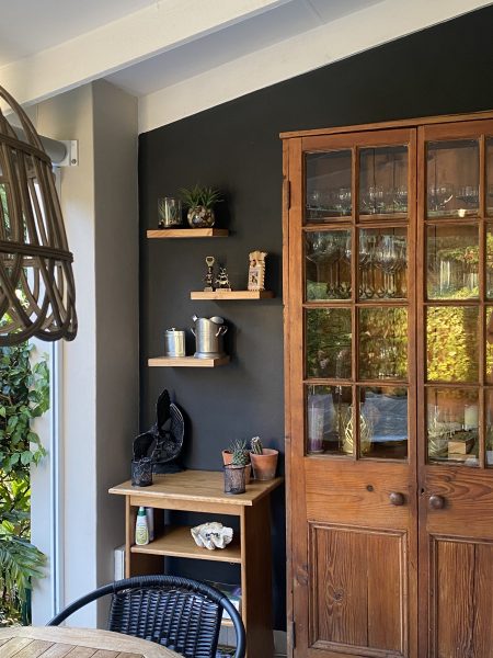 Photo of an antique wooden cupboard.